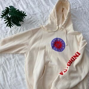 Cream Coachella Hoodie with Graphic Design and Line Up